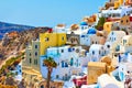 Houses of different colours in Santorini