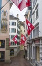 Houses with flags of Switzerland in Zurich. Zurich old town. The historical part of Zurich