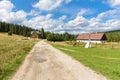 Houses at the forest path in Jizera Mountains Royalty Free Stock Photo