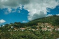 Houses going up on the hilly landscape with terraced fields