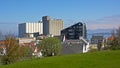 Houses, grain silo`s and modern apartment building in Stavanger harbor