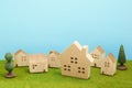 Houses on green grass over blue sky. Royalty Free Stock Photo