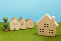 Houses on green grass over blue sky. Royalty Free Stock Photo