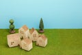 Houses on green grass over blue sky. Royalty Free Stock Photo