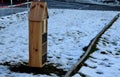 butterflies for moths and butterflies. in a city park on a housing estate in the winter stands in the snow  road barrier Royalty Free Stock Photo