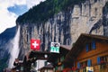 Houses in Lauterbrunnen (Switzerland) and Staubbach Falls Royalty Free Stock Photo