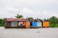 Houses of local people staying along river Royalty Free Stock Photo