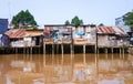 Houses of local people staying along river Royalty Free Stock Photo