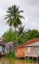 Houses of local people staying along river Royalty Free Stock Photo