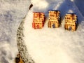 Houses of Matches standing on Snowy Mountain