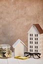 Houses models on white wooden table