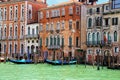 Houses with moored gondolas along Grand Canal in Venice, Italy