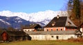 Houses and Mountain with Snow at Salzkammergut