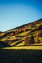 Houses on a mountain during sunset in Santa Magdalena Dolomites Tyrol Italy