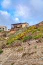 Houses on moutain with flowers overlooking ocean in San Diego California Royalty Free Stock Photo