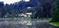 Houses near the lake in the kodaikanal lake. Royalty Free Stock Photo