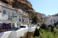 Houses nestled in the rock in Setenil de las Bodegas. The famous street `Cuevas del Sol`