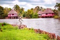 Houses over water in traditional indian village Boca de Guama Nature Reserve, Cuba Royalty Free Stock Photo