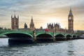 Houses of Parliament, Big Ben and Westminster bridge at sunset, London, United Kingdom Royalty Free Stock Photo