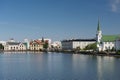 Houses and small church near the lake in the center of Reykjavik Royalty Free Stock Photo