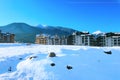 Houses and snow mountains panorama in Bansko, Bulgaria Royalty Free Stock Photo