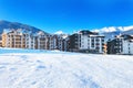 Houses and snow mountains panorama in Bansko, Bulgaria Royalty Free Stock Photo