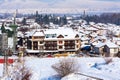 Houses and snow mountains panorama in bulgarian ski resort Bansko Royalty Free Stock Photo