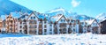 Houses and snow mountains panorama in bulgarian ski resort Bansko