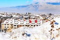 Houses with snow roofs panorama in Bansko, Bulgaria Royalty Free Stock Photo