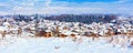 Houses with snow roofs panorama in bulgarian ski resort Bansko Royalty Free Stock Photo