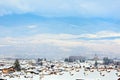 Houses with snow roofs panorama in bulgarian ski resort Bansko Royalty Free Stock Photo