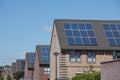 Houses with solar panels on the roof for alternative energy Royalty Free Stock Photo