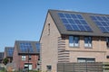 Houses with solar panels on the roof for alternative energy Royalty Free Stock Photo