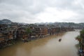 Houses on stilts by the river in Phoenix Town, China