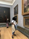 Visitors at Tate Britain art museum on Millbank in the City of Westminster in London