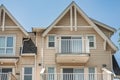 Houses in suburb in the north America. Top of a house with nice windows over blue sky. Beautiful Home Exterior Royalty Free Stock Photo