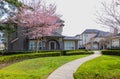 Houses in suburb with Spring Blossom in the north America. Luxury houses with pink coloured landscape Royalty Free Stock Photo