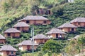 Houses and tea lantation on a hillside in the Kuomintang Chinese village of Mae Aw or Baan Rak Thai, Mae Hong Son, Thailand