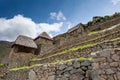 The houses and terraces of the ancient city of Machu Picchu, Peru. Royalty Free Stock Photo