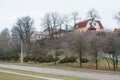 Houses on the top of the hill near the road Royalty Free Stock Photo