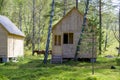 Houses for tourists from a tree in the wood in summer