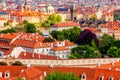 Houses with traditional red roofs in Prague with Charles Bridge, Czech Republic Royalty Free Stock Photo