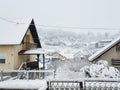 Houses and trees and fences under white snow - village Milanovac at winter, Croatia Royalty Free Stock Photo