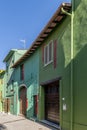 The houses of the village of Ghizzano, Pisa, Italy, colored with various shades of green