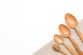 Houseware: wooden kitchen utensils, isolated on white background top view. Zero waste, eco friendly concept. Flat lay