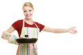 Housewife or chef in kitchen apron with skillet frying pan Royalty Free Stock Photo