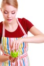 Housewife or chef in kitchen apron using apple timer isolated Royalty Free Stock Photo