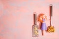 Housewife cleaner. lady housewife, fashionable dress, doll fashion. The girl is cooking pasta. Copy space. Flat Lay. Top