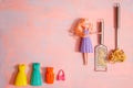 Housewife cleaner. lady housewife, fashionable dress, doll fashion. The girl is cooking pasta. Copy space. Flat Lay. Top