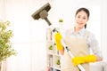 Housewife cleaning floor with vacuum Royalty Free Stock Photo
